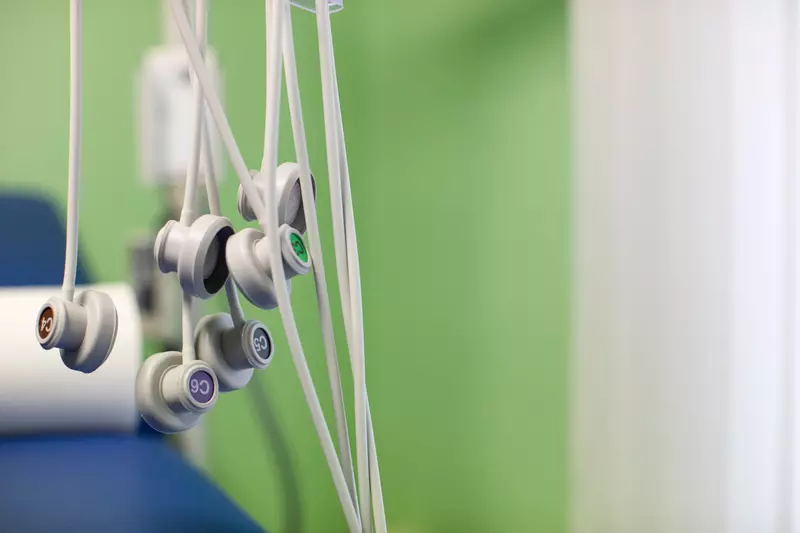 ECG probes hanging in a hospital room